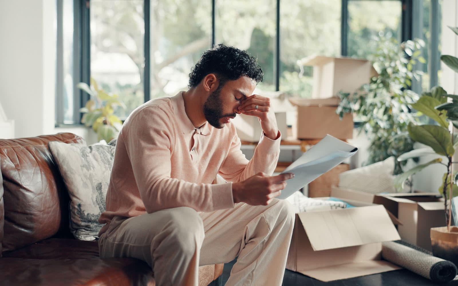 Homeowner reviewing solar contract pages and notes